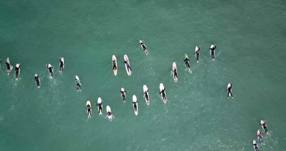Surfers waiting for waves